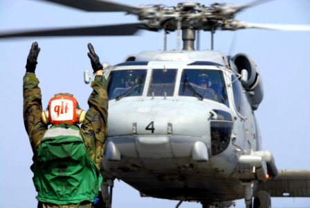 US Navy 110313-N-KF029-158 An SH-60F Sea Hawk helicopter assigned to the Black Knights of Helicopter Anti-Submarine Squadron (HS) 4, launches off t