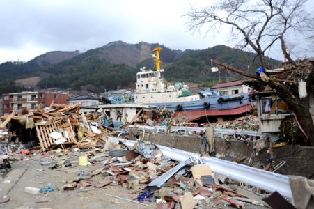 US Navy 110315-N-2653B-148 A tug boat is among debris in Ofunato, Japan, following a 9.0 magnitude earthquake and subsequent tsunami