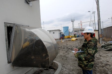 US Navy 110315-N-ZI955-093 Ariel Genido assesses the damage to Fleet and Industrial Supply Center Yokosuka Defense Fuel Support Point Hachinohe