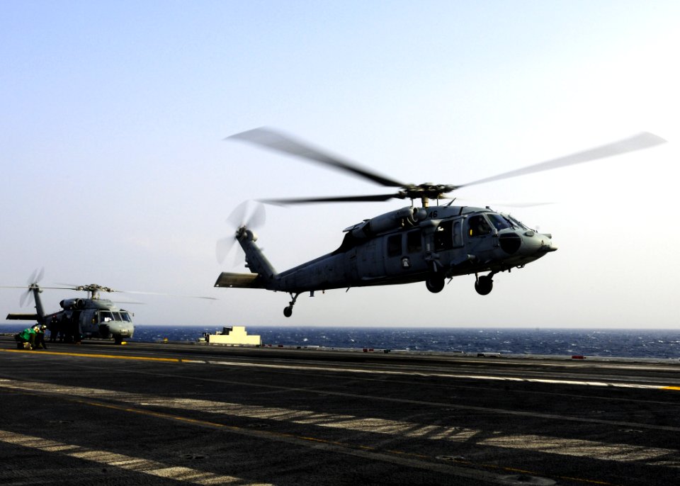US Navy 110314-N-5503T-232 An MS-60S Sea Hawk helicopter assigned to the Wildcards of HSC-23 lifts off from the aircraft carrier USS Ronald Reagan