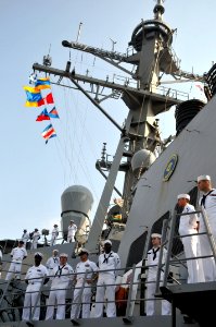 US Navy 110316-N-9818V-141 Sailors man the rails of the Arleigh Burke-class guided-missile destroyer USS Decatur (DDG 73)