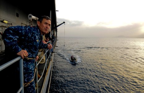 US Navy 110314-N-OM642-179 Vice Adm. Harry B. Harris Jr., commander of the U.S. 6th Fleet, observes small boat operations aboard the amphibious com