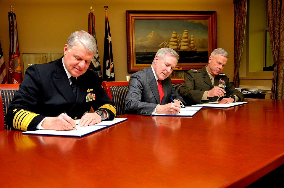 US Navy 110314-N-ZB612-014 Adm. Gary Roughead, left, along with the Honorable Ray Mabus and Gen. James F. Amos sign a Memorandum of Understanding o