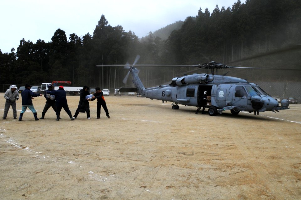 US Navy 110315-N-IC111-128 Sailors assigned to the Black Knights of Helicopter Anti-Submarine Squadron (HS) 4 embarked aboard the aircraft carrier