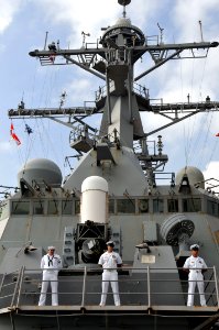 US Navy 110319-N-9818V-065 Sailors man the rails of the Arleigh Burke-class guided-missile destroyer USS Decatur (DDG 73)