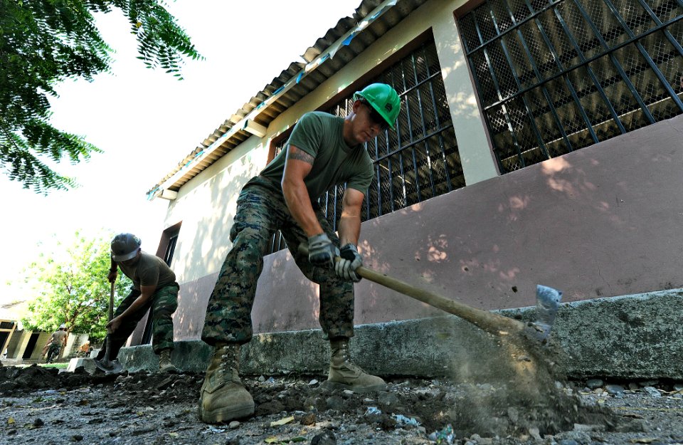 US Navy 110315-N-WX845-017 quipment Operator 3rd Class John Guillen-Agudero, assigned to Naval Mobile Construction Battalion (NMCB) 28