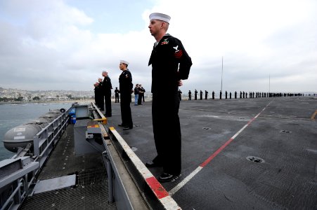 US Navy 110319-N-ZL940-125 Sailors assigned to the aircraft carrier USS Abraham Lincoln (CVN 72) man the rails as the ship pulls into San Diego photo