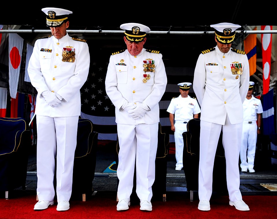 US Navy 110317-N-WP746-237 Rear Adm. Dixon Smith, left, commander of Naval Surface Group, Middle Pacific, Capt. John T. Lauer