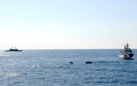 US Navy 110318-N-8288P-167 Sailors assigned to the Arleigh Burke-class guided-missile destroyer USS Fitzgerald (DDG 62), left, and members of the J