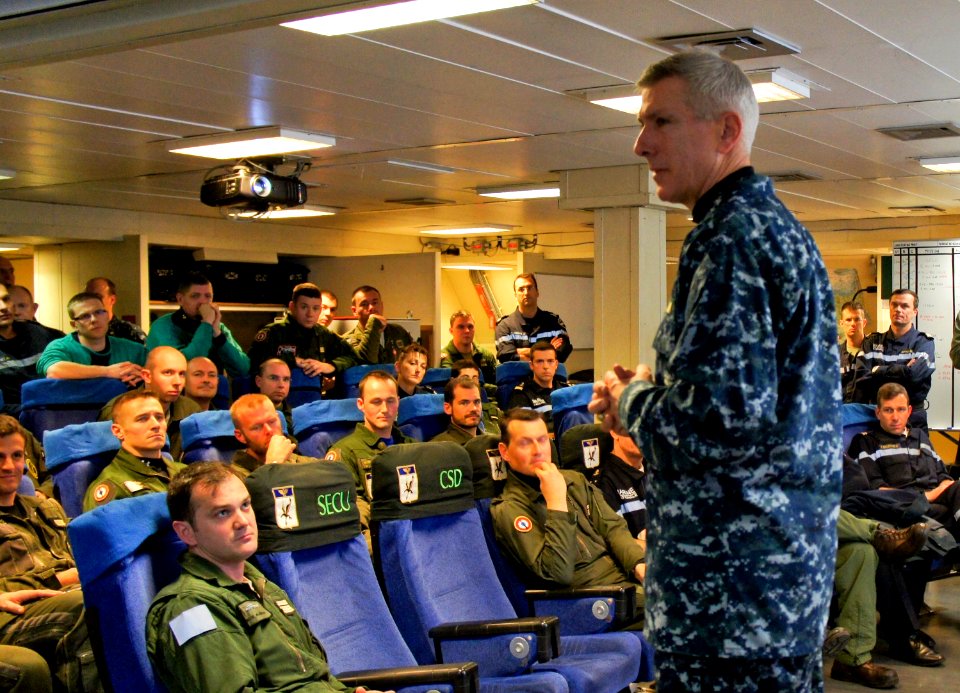 US Navy 110321-N-0000X-027 Adm. Samuel J. Locklear, III speaks with an aircrew team from the French Navy aircraft carrier Charles de Gaulle (R91)
