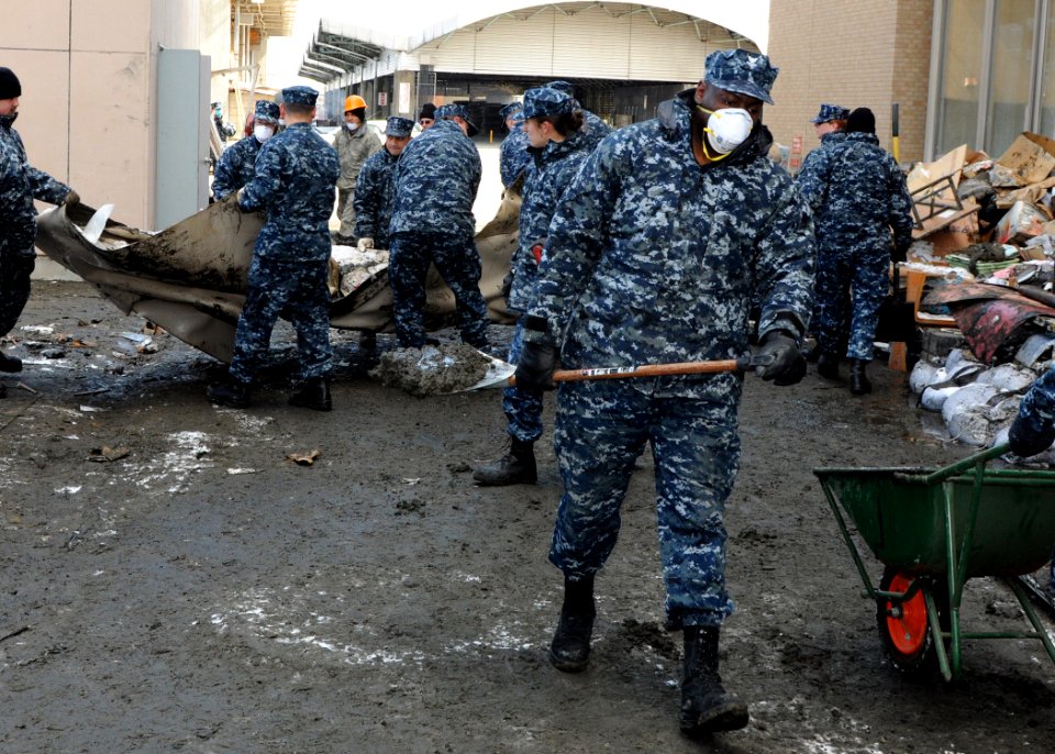 US Navy 110317-N-MU720-019 Logistics Specialist 2nd Class Robert Bannister from Chicago, assigned to Fleet and Industrial Supply Center Misawa, rem