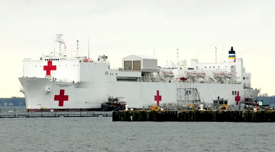 US Navy 110321-N-EP471-482 The Military Sealift Command hospital ship USNS Comfort (T-AH 20) pulls into Naval Station Norfolk to pick up personnel