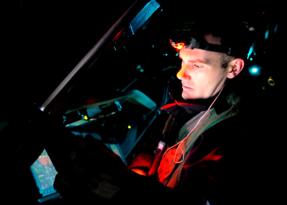 US Navy 110319-N-3154P-337 Aviation Electrician's Mate 2nd Class Joseph Fremen, assigned to Helicopter Sea Combat Squadron (HSC) 22, calibrates the