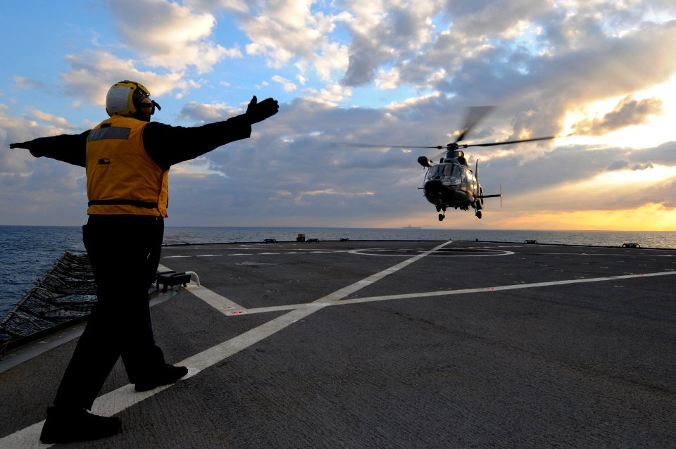 US Navy 110321-N-OM642-039 A French navy AS365 F Dauphin rescue helicopter test lands aboard USS Mount Whitney (LCC-JCC 20)