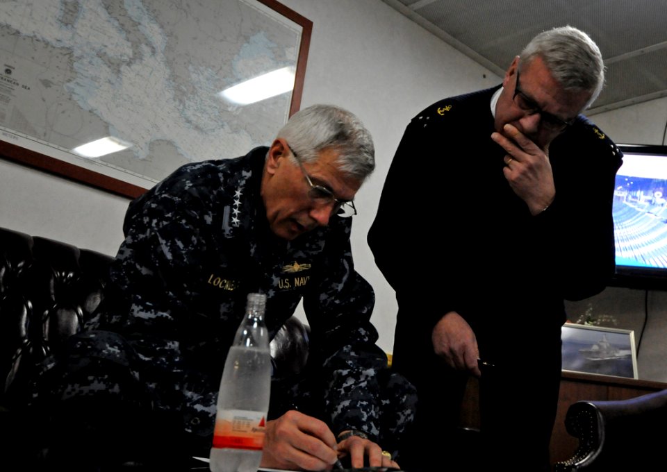 US Navy 110322-N-AQ172-023 Adm. Samuel J. Locklear, III, left, commander of Joint Task Force Odyssey Dawn, speaks with French navy Vice Adm. Jean-P