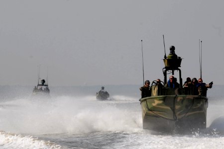 US Navy 110322-N-YO394-022 Sailors assigned to Riverine Squadron (RIVRON) 3 and marines from the Royal Netherlands marine corps conduct open-water