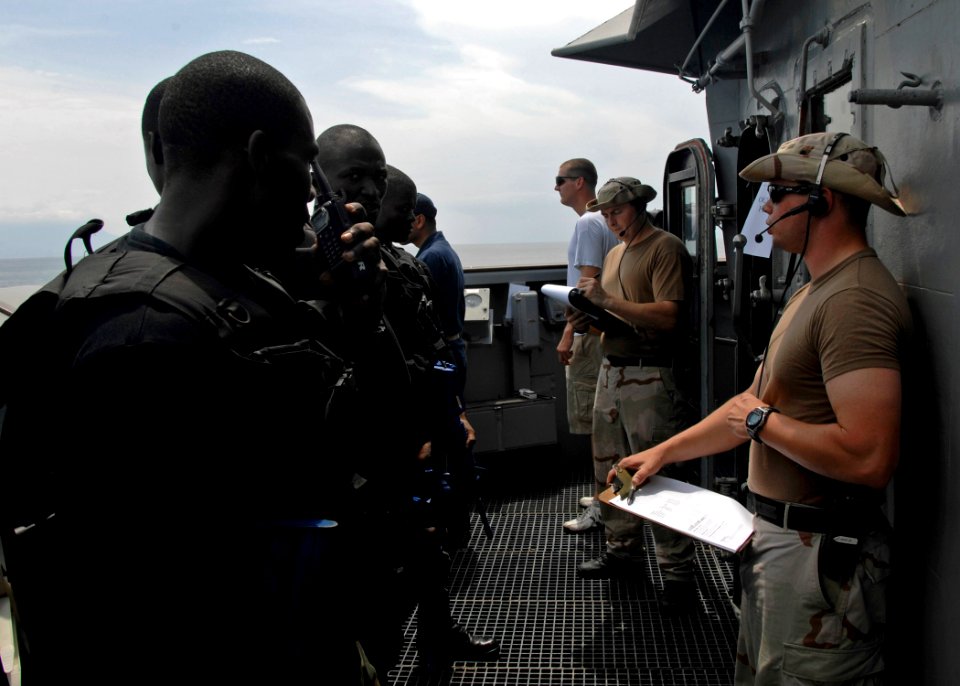 US Navy 110321-N-HI707-258 A Cameroonian navy visit, board, search, and seizure team boards the guided-missile frigate USS Robert G. Bradley (FFG 4