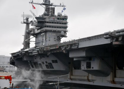 US Navy 110321-N-IO627-022 The forward-deployed aircraft carrier USS George Washington (CVN 73) departs Commander Fleet Activities Yokosuka i