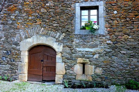 Door wood stone wall old stones photo