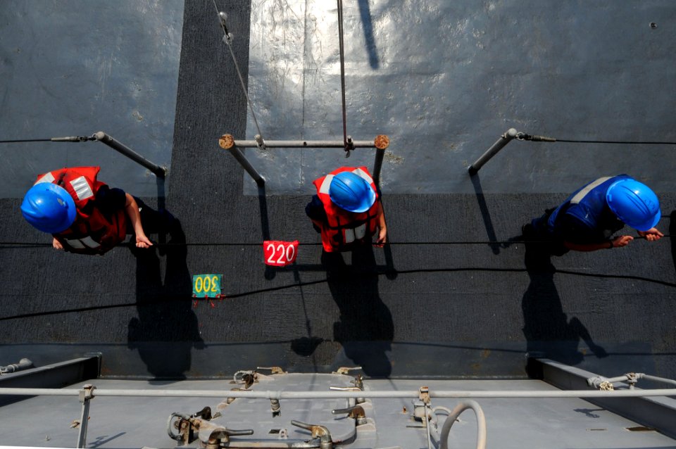 US Navy 110324-N-RC734-080 Sailors man the phone and distance line aboard the amphibious dock landing ship USS Comstock (LSD 45) during an underway