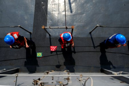 US Navy 110324-N-RC734-080 Sailors man the phone and distance line aboard the amphibious dock landing ship USS Comstock (LSD 45) during an underway