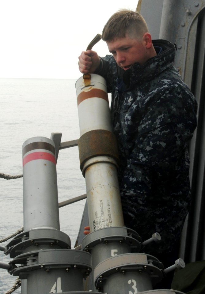US Navy 110323-N-8288P-030 Cryptologic Technician (Technical) 3rd Class Cord Carnes,assigned to the Arleigh Burke-class guided-missile destroyer US