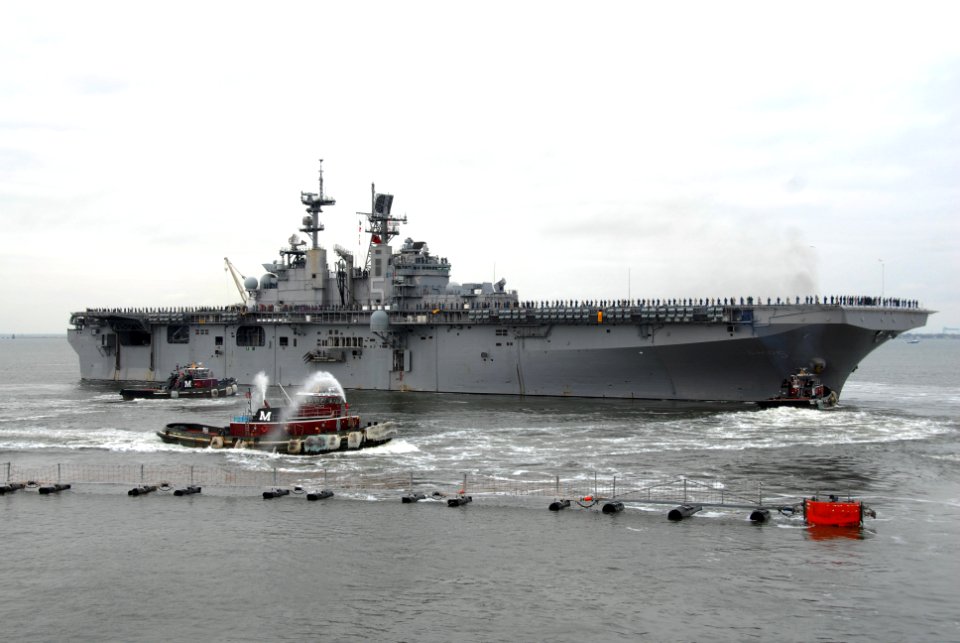 US Navy 110323-N-VK779-069 The amphibious assault ship USS Bataan (LHD 5) departs Naval Station Norfolk as part of the Bataan Amphibious Ready Grou