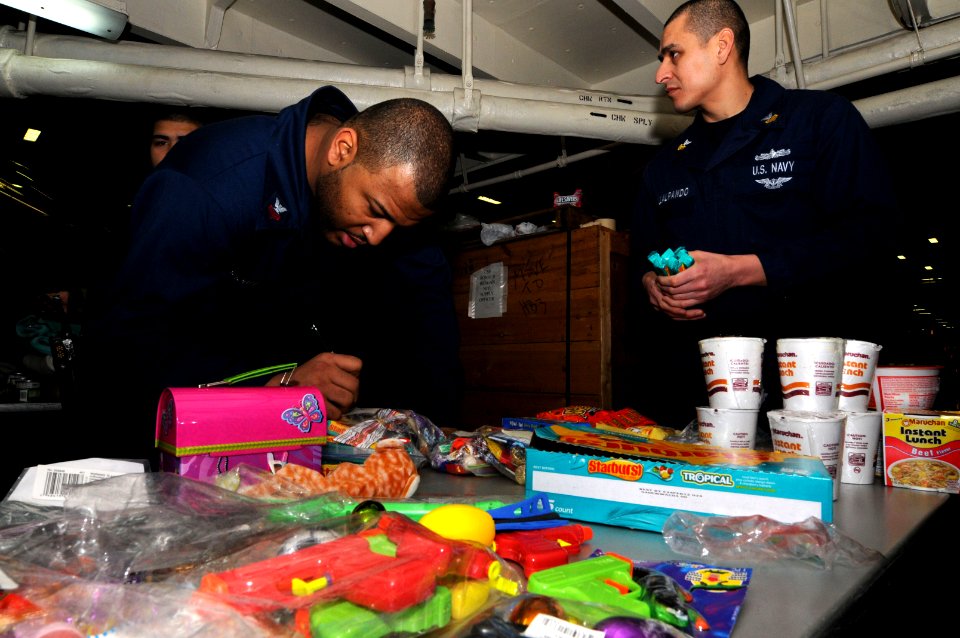 US Navy 110326-N-NB544-049 nformation Systems Technician 1st Class Dwight Scorza, left, and Information Systems Technician 1st Class Eustacio Villa