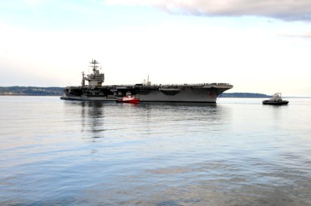 US Navy 110324-N-AE328-005 he aircraft carrier USS Abraham Lincoln (CVN 72) arrives at its homeport of Everett, Wash. after a six-month deployment photo