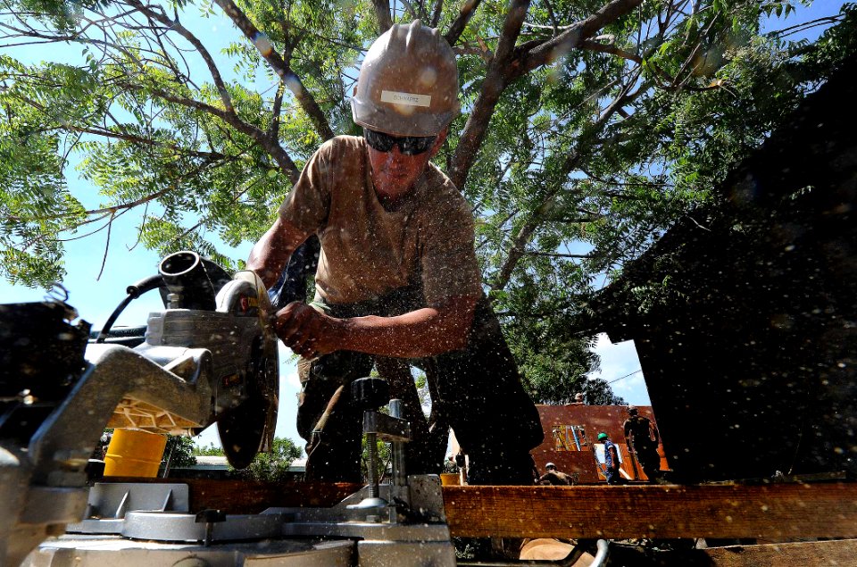 US Navy 110323-N-WX845-136 Equipment Operator 3rd Class Mark Schwartz, assigned to Naval Mobile Construction Battalion (NMCB) 28