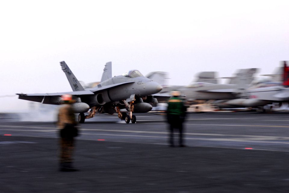 US Navy 110329-N-SB672-514 An F-A-18C Hornet assigned to the Death Rattlers of Marine Fighter Attack Squadron (VMFA) 323 bolters on the aircraft ca