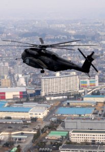 US Navy 110331-N-5716H-324 An MH-53E Sea Dragon helicopter prepares to land at a Japan Self-Defense Force airfield