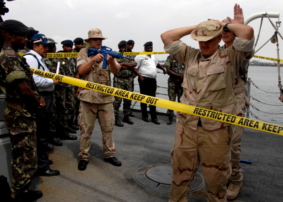 US Navy 110330-N-HI707-567 An Angolan visit, board, search and seizure team watches during an Africa Partnership Station tactics demonstration