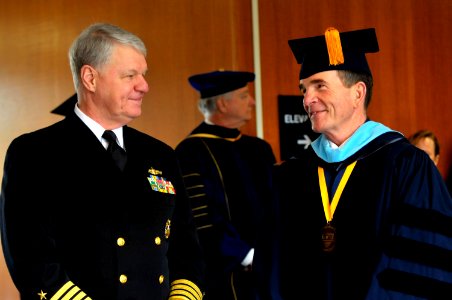 US Navy 110325-N-ZB612-008 Chief of Naval Operations (CNO) Adm. Gary Roughead speaks with retired Vice Adm. Daniel Oliver, president of the Naval P