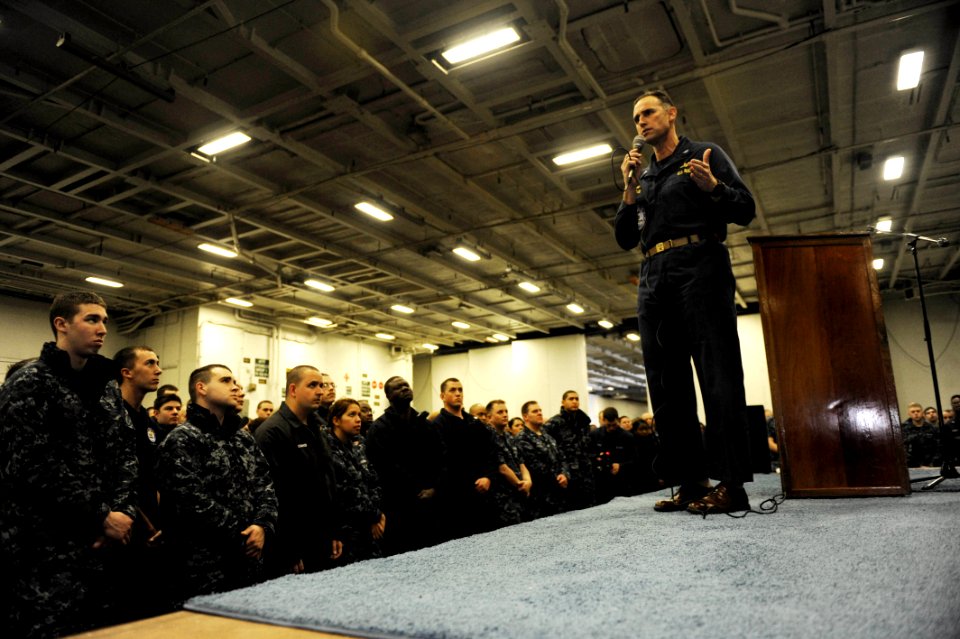 US Navy 110325-N-OY799-109 Capt. Ronald Reis, commanding officer of the aircraft carrier USS John C. Stennis (CVN 74), addresses the crew while the