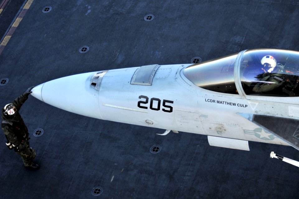 US Navy 110328-N-DM338-301 An F-1A-18E Super Hornet assigned to the Argonauts of Strike Fighter Squadron (VFA) 147 is prepared for takeoff from the