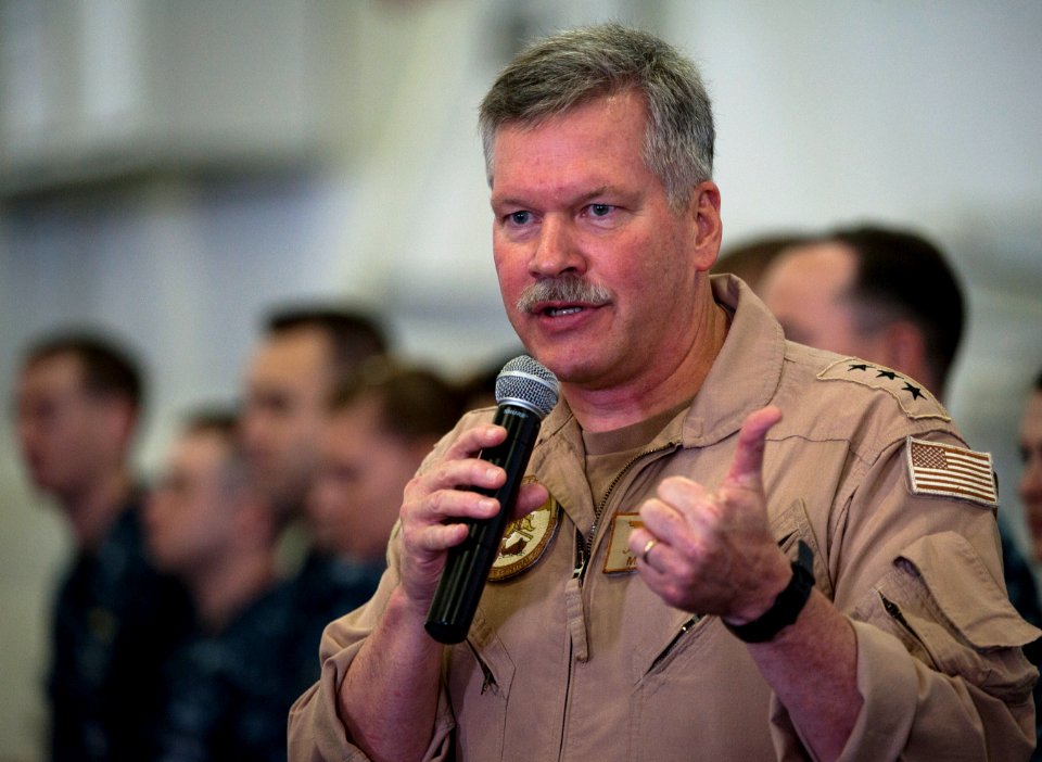 US Navy 110329-N-DR144-455 Vice Adm. Mark Fox addresses the crew of USS Carl Vinson (CVN 70) during an all-hands call in the ship's hangar bay