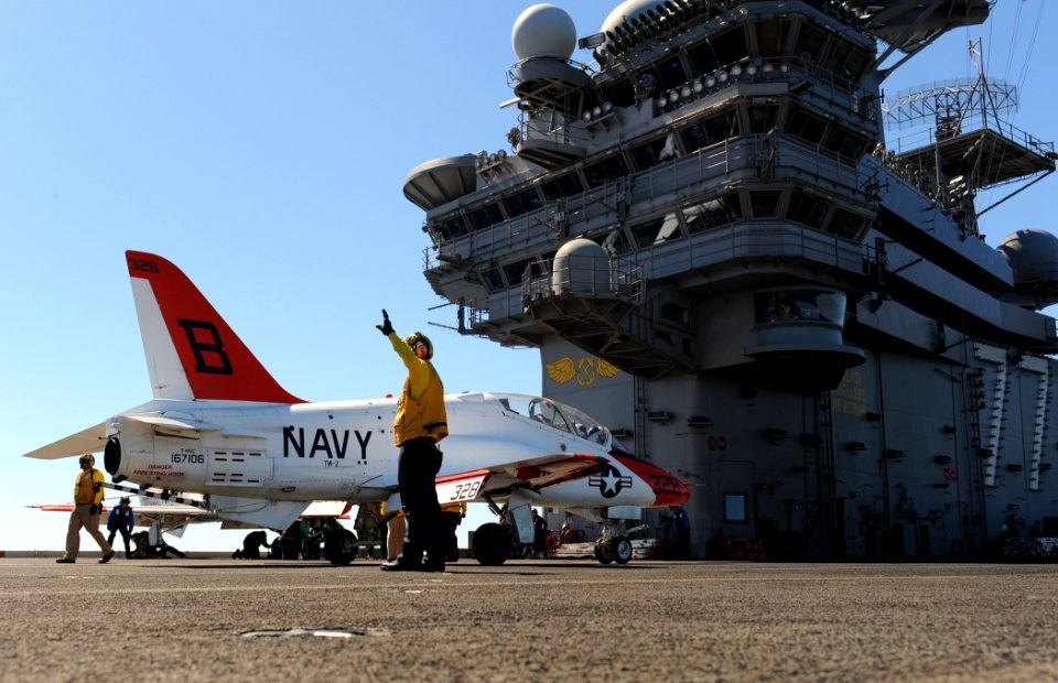 US Navy 110403-N-TB177-081 A T-45C Goshawk training aircraft assigned to Carrier Training Wing (CTW) 2 is moved across the flight deck aboard the