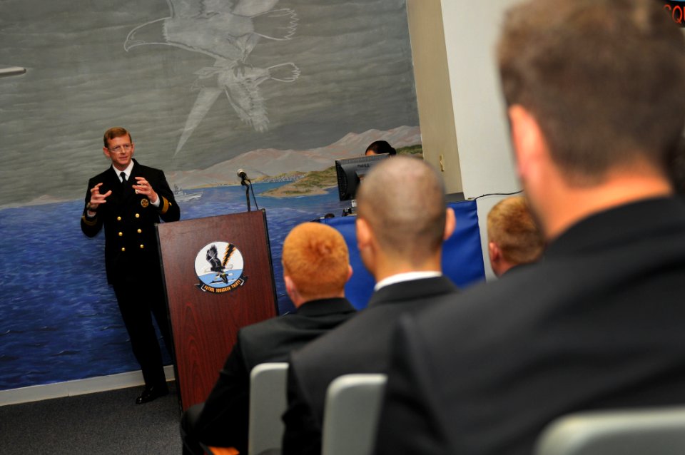 US Navy 110401-N-YR391-005 Rear Adm. Michael Hewitt, commander of Patrol and Reconnaissance Group, talks to flight officers and guests