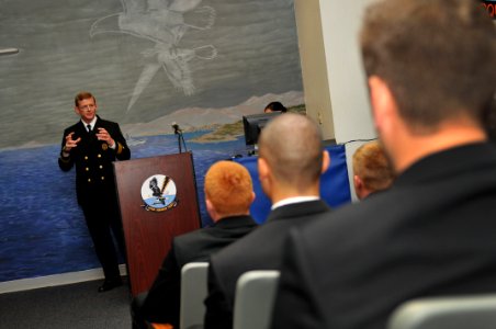 US Navy 110401-N-YR391-005 Rear Adm. Michael Hewitt, commander of Patrol and Reconnaissance Group, talks to flight officers and guests photo
