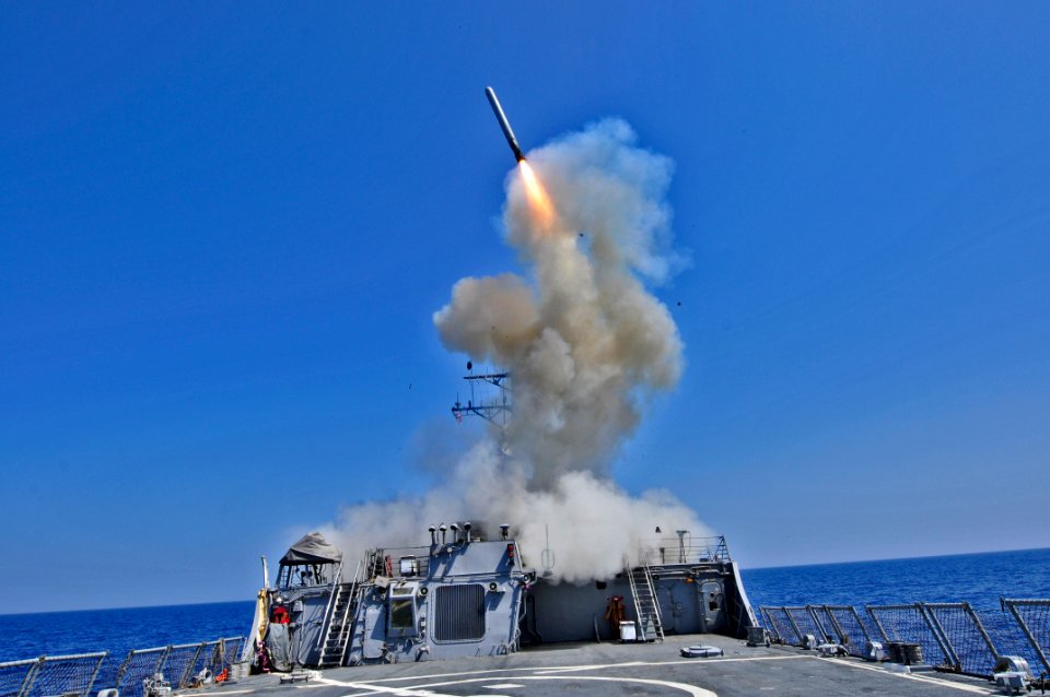 US Navy 110329-N-XO436-010 The Arleigh Burke-class guided-missile destroyer USS Barry (DDG 52) launches a Tomahawk cruise missile to support Joint