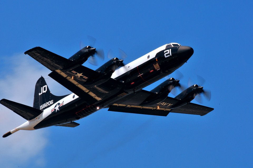 US Navy 110404-N-YR391-005 A P3-C Orion donning a heritage paint scheme soars over Naval Air Station Jacksonville as part of the Centennial of Nava