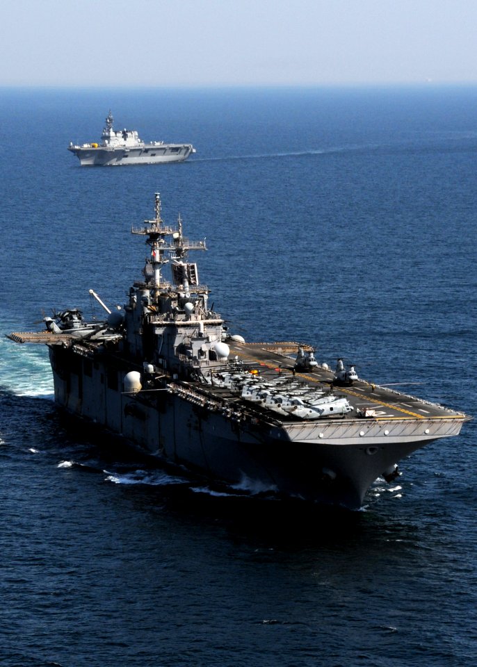 US Navy 110406-N-0120A-001 USS Essex (LHD 2) transits in formation as JS Hyuga (DDH 181) transits in the background