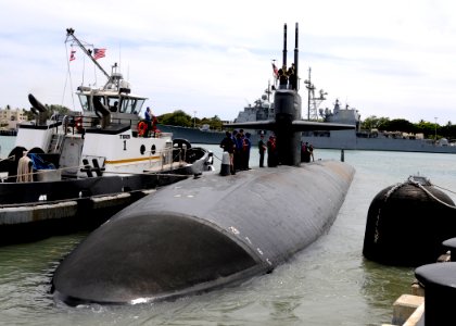 US Navy 110405-N-UK333-090 USS Bremerton (SSN 698) departs Joint Base Pearl Harbor-Hickam for a six-month deployment to the western Pacific region photo