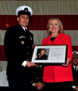 US Navy 110401-N-KD852-405 Secretary of State Hillary Rodham Clinton presents a letter of congratulations and signed photo to Chief Culinary Specia