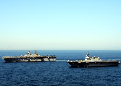 US Navy 110406-N-0120A-512 USS Essex (LHD 2) transits in formation with JS Hyuga (DDH 181)
