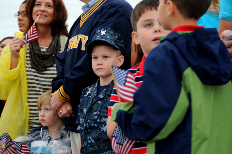 US Navy 110405-N-DD445-002 Family and friends of Sailors assigned to USS Doyle (FFG 39) gather as the ship pulls into Naval Station Mayport after a
