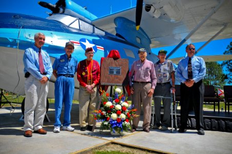 US Navy 110406-N-YR391-008 World War II Navy veterans and their sons pose for a photo during a PBY-5A BUNO 6582 dedication at Naval Air Station Jac