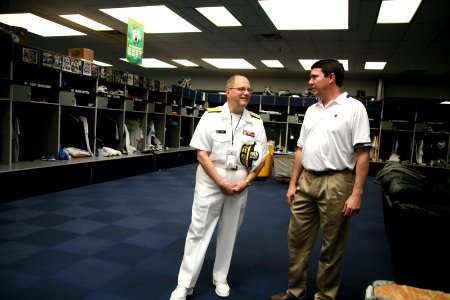 US Navy 110405-N-YM440-034 Rear Adm. Richard C. Vinci tours the Dallas Cowboys facility with head trainer Jim Maurer during Dallas Fort Worth Navy