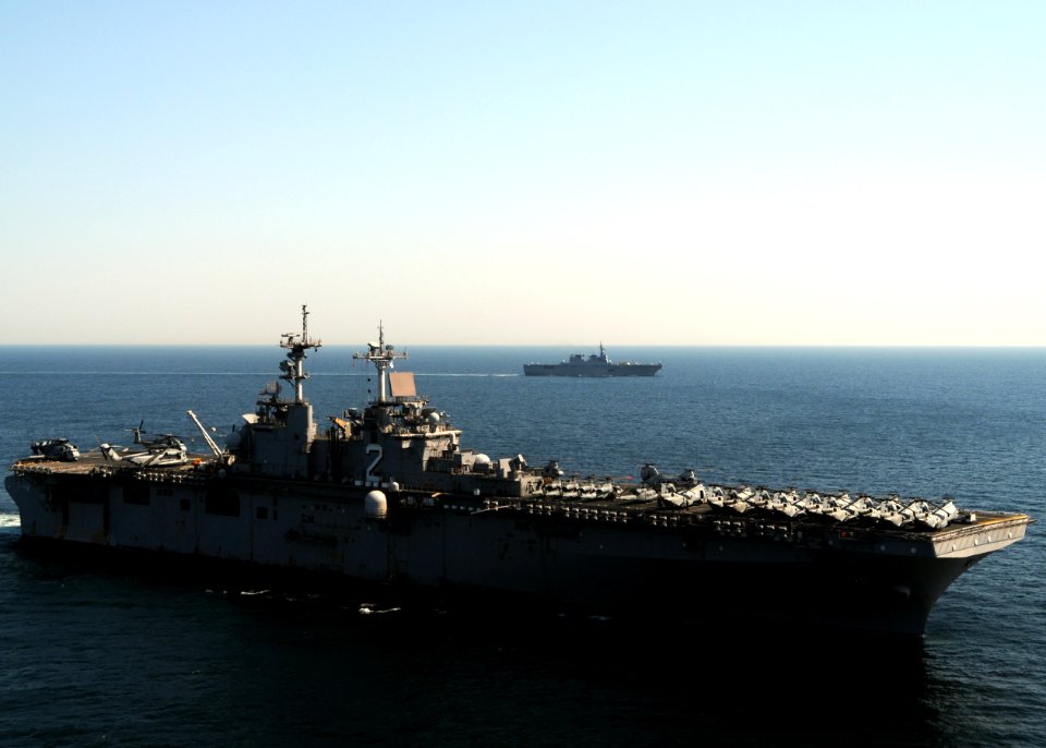 US Navy 110406-N-0120A-404 USS Essex (LHD 2) transits in formation with JS Hyuga (DDH 181)